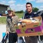 Sheriff Deputy Acosta assists food pantry client