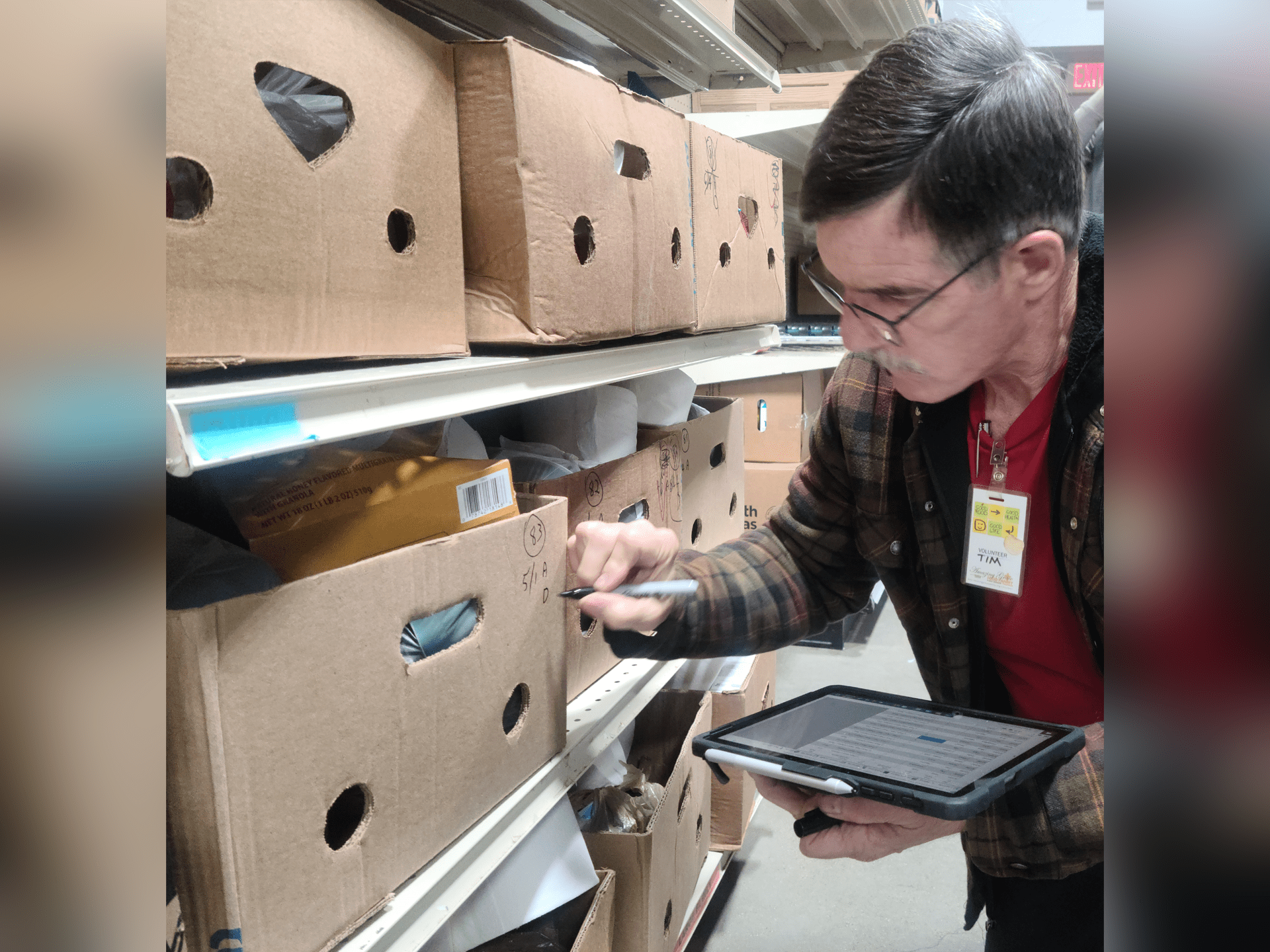 Tim uses technology at Amazing Grace Food Pantry